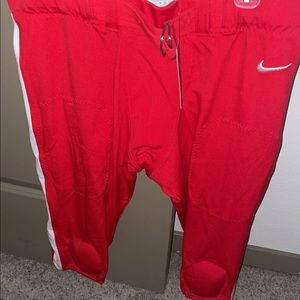 2-XL red Nike football pants
